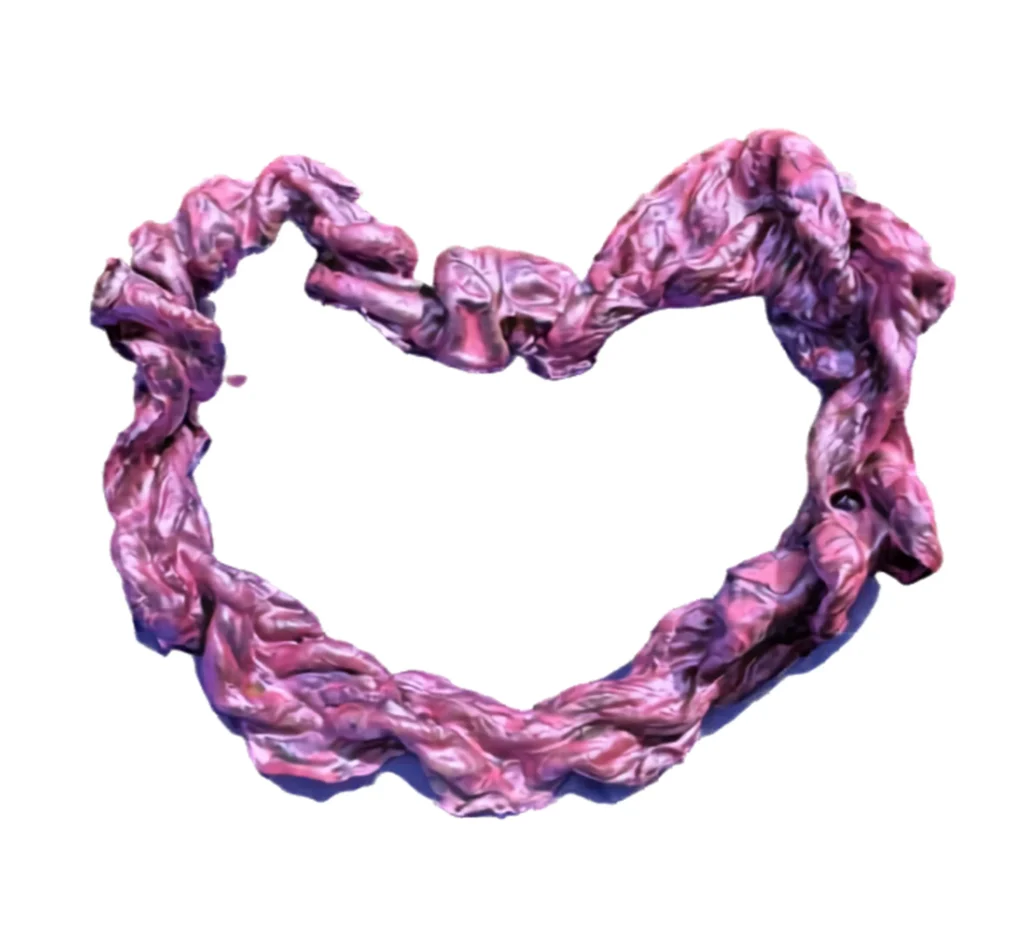 Umbilical cord keepsake shaped like a heart, in pink and purple